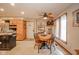 Eat-in dining area located off of the kitchen with access to the back door and windows at 206 Somerville Rd, Anderson, IN 46011
