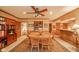 Traditional dining room with a solid wood table and chairs, built-in bookshelves, and textured walls at 206 Somerville Rd, Anderson, IN 46011