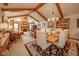 Spacious living room featuring high ceilings, wooden beams, and a fireplace at 206 Somerville Rd, Anderson, IN 46011
