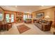 Inviting living room with a brick fireplace, plush seating, and classic decor at 206 Somerville Rd, Anderson, IN 46011