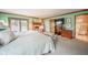 Spacious main bedroom features a fireplace, access to a private deck, and an en-suite bathroom at 206 Somerville Rd, Anderson, IN 46011