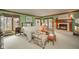 Bright and spacious main bedroom features a fireplace and a door to the exterior deck at 206 Somerville Rd, Anderson, IN 46011