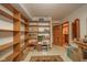 Spacious storage room with built-in shelving and easy access to other areas of the home at 206 Somerville Rd, Anderson, IN 46011