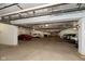 Well-lit basement parking garage provides secure and ample parking for residents at 20971 Shoreline Ct # 214, Noblesville, IN 46062