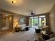A spacious living room is flooded with light and has a fan to keep you comfortable at 20971 Shoreline Ct # 214, Noblesville, IN 46062