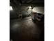 Unfinished basement space with concrete floor, pipes, and laundry station at 2124 W 64Th St, Indianapolis, IN 46260