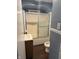 Full bathroom featuring a shower-tub combo and single sink vanity at 2124 W 64Th St, Indianapolis, IN 46260