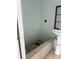 A different angle of the small bathroom with a sink, showing some incomplete finishes at 2124 W 64Th St, Indianapolis, IN 46260