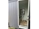 Exterior shot of a small bathroom featuring tile flooring and a pedestal sink at 2124 W 64Th St, Indianapolis, IN 46260