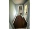 Inviting foyer featuring a coat closet and a decorative glass front door at 2124 W 64Th St, Indianapolis, IN 46260