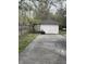 Detached garage in backyard with driveway at 2124 W 64Th St, Indianapolis, IN 46260