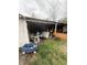 View into an extremely cluttered shed filled with miscellaneous items and debris at 2124 W 64Th St, Indianapolis, IN 46260