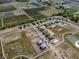 Aerial view of the community's ponds and new homes under construction at 2199 Warbler St, Danville, IN 46122