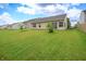 A spacious backyard with lush green grass, perfect for outdoor activities and relaxation at 2390 Lakecrest Dr, Columbus, IN 47201