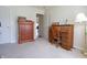 Bedroom featuring carpet floors, a closet, white trim, and a desk at 2390 Lakecrest Dr, Columbus, IN 47201
