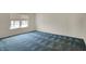 Bedroom featuring one window, neutral walls, and blue patterned carpet at 2755 Rylee Ct, Greenwood, IN 46143