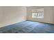 Bedroom featuring one window, neutral walls, and blue patterned carpet at 2755 Rylee Ct, Greenwood, IN 46143