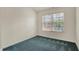 Neutral bedroom with one window, neutral walls, and blue patterned carpet at 2755 Rylee Ct, Greenwood, IN 46143