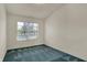 Neutral bedroom with vaulted ceiling, one window, neutral walls, and blue patterned carpet at 2755 Rylee Ct, Greenwood, IN 46143
