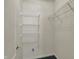 A walk-in closet with ample storage shelves, ready to organize your wardrobe at 2755 Rylee Ct, Greenwood, IN 46143