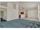 Large living room boasts vaulted ceilings, a ceiling fan, and a view into the eat-in kitchen at 2755 Rylee Ct, Greenwood, IN 46143