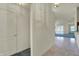 Open-concept living area with tile flooring leading to carpeted living room at 2755 Rylee Ct, Greenwood, IN 46143
