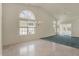 Spacious living room with high ceilings, large windows, and chandelier at 2755 Rylee Ct, Greenwood, IN 46143
