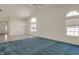Bright living room features vaulted ceilings, lots of natural light, and an open floor plan at 2755 Rylee Ct, Greenwood, IN 46143