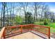 Enjoy the outdoors on this wooden deck with a scenic view of the surrounding nature at 2755 Rylee Ct, Greenwood, IN 46143