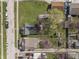 Aerial view of the property, showcasing its location amidst tree-lined streets and neighboring homes at 282 N Vine St, Plainfield, IN 46168