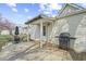 Charming backyard deck features a grill, seating, and access to the home, great for entertaining at 282 N Vine St, Plainfield, IN 46168