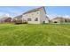 Expansive backyard with lush green grass, a wooden deck, and plenty of space for outdoor activities at 2859 Dursillas Dr, Plainfield, IN 46168