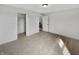 Bright bedroom features neutral carpet, walk-in closet, and access to other areas of the home at 2859 Dursillas Dr, Plainfield, IN 46168