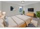 Calm and serene bedroom with soft lighting, a cozy bed, and stylish decor at 2859 Dursillas Dr, Plainfield, IN 46168