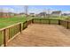 Large wooden deck offering an ideal spot for outdoor relaxation and entertaining with backyard views at 2859 Dursillas Dr, Plainfield, IN 46168