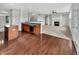 Open concept kitchen with granite countertops, stainless steel appliances, and hardwood floors at 2859 Dursillas Dr, Plainfield, IN 46168
