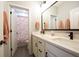 Stylish bathroom featuring a double vanity with black hardware and tile flooring at 2932 Camden Ct, Greenwood, IN 46143