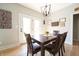 Cozy dining room with a wooden table, comfortable chairs, and natural light at 2932 Camden Ct, Greenwood, IN 46143