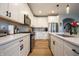Beautiful kitchen with modern appliances, white cabinets, and quartz countertops at 2932 Camden Ct, Greenwood, IN 46143