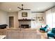 Inviting living room with a fireplace, built-in shelves, comfortable seating, and stylish decor at 2932 Camden Ct, Greenwood, IN 46143