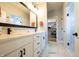 Elegant main bathroom with double vanity, marble floors, walk-in closet, and glass shower at 2932 Camden Ct, Greenwood, IN 46143
