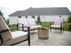 Back patio featuring outdoor seating and a modern fire pit, perfect for entertaining or relaxing outside at 2932 Camden Ct, Greenwood, IN 46143