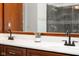 Bathroom vanity featuring double sinks, granite countertops, and modern fixtures at 3165 Hazel Foster W Ct, Carmel, IN 46033
