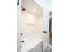 Clean bathroom featuring a shower with white subway tile and black hardware at 3165 Hazel Foster W Ct, Carmel, IN 46033