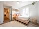 Charming bedroom featuring a cozy bed, ample natural light, and modern decor at 3165 Hazel Foster W Ct, Carmel, IN 46033