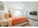 Vaulted ceiling Primary bedroom featuring stylish decor, a ceiling fan, and ample natural light at 3165 Hazel Foster W Ct, Carmel, IN 46033