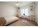 Airy bedroom featuring a desk with floating shelves and large window at 3165 Hazel Foster W Ct, Carmel, IN 46033