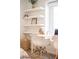 Well-lit bedroom with a built-in desk area and floating shelves at 3165 Hazel Foster W Ct, Carmel, IN 46033