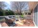 Outdoor deck with stylish seating, perfect for relaxation and entertaining in a serene outdoor setting at 3165 Hazel Foster W Ct, Carmel, IN 46033
