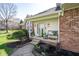 Charming front porch with decorative plants, a bench, and an inviting entrance to the home at 3165 Hazel Foster W Ct, Carmel, IN 46033